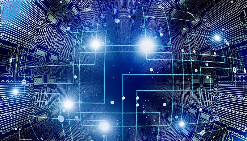 Immagine futuristica che rappresenta circuiti e luci, simboleggiando la scienza e la nuova concezione della realt&agrave;.